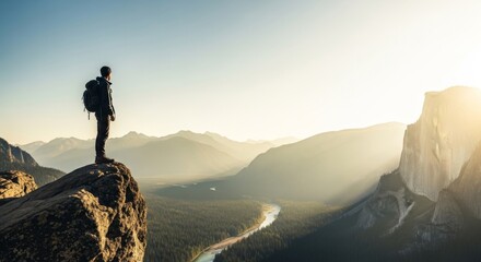 Adventurous Hiker Stands on Mountain Peak Overlooking a Breathtaking Valley at Sunrise.