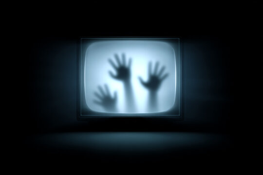 Eerie Image of Hands Silhouetted on A Television Screen, Creating a Creepy, Spooky, and Dark Vibe