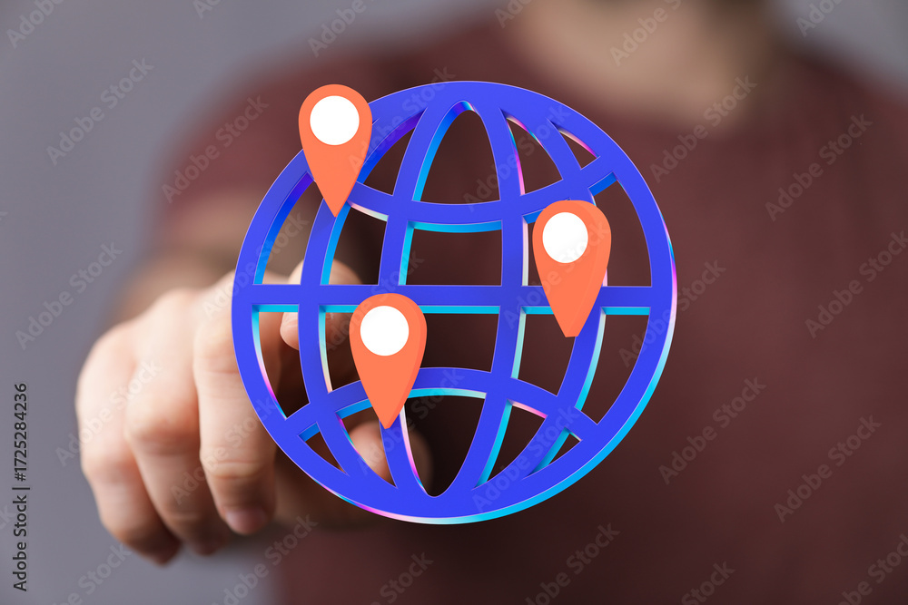 Poster hand pointing at a digital globe with location markers, symbolizing global reach and connectivity.