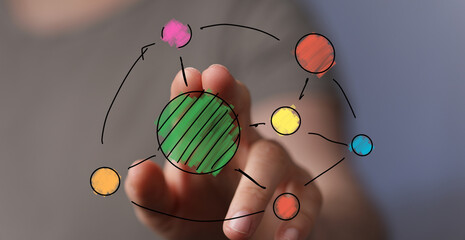 Abstract concept image: hand interacts with a vibrant network. Ideal for technology, connection, and teamwork.