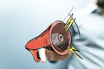 Hand holding megaphone,loud announcement,marketing, promotion, advertising concept.