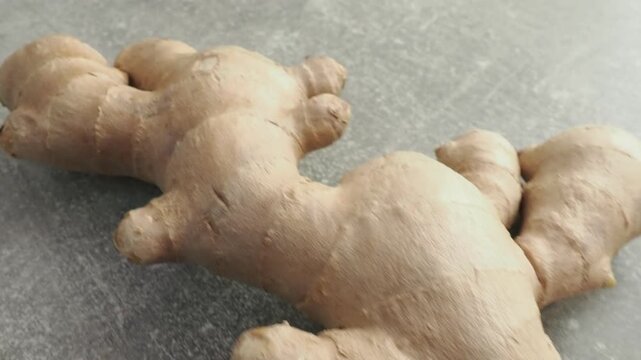 Fresh ginger on wooden background. Dry ginger. Sliced ginger with honey and lemon. Ginger root. Traditional alternative medicine, healing tea for immunity. Seasoning and spices concept. Copy space.