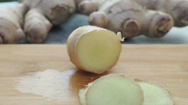 Fresh ginger on wooden background. Dry ginger. Sliced ginger with honey and lemon. Ginger root. Traditional alternative medicine, healing tea for immunity. Seasoning and spices concept. Copy space.