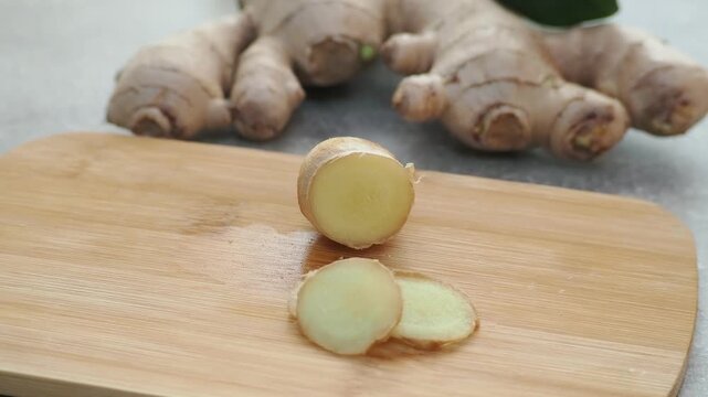 Fresh ginger on wooden background. Dry ginger. Sliced ginger with honey and lemon. Ginger root. Traditional alternative medicine, healing tea for immunity. Seasoning and spices concept. Copy space.