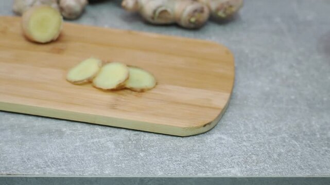 Fresh ginger on wooden background. Dry ginger. Sliced ginger with honey and lemon. Ginger root. Traditional alternative medicine, healing tea for immunity. Seasoning and spices concept. Copy space.