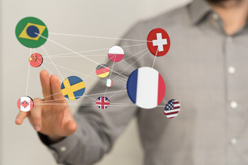 Image of interconnected flags symbolizing global business, trade, and partnerships.