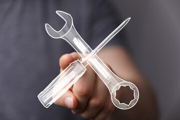 Digital illustration of hand holding wrench and screwdriver.  Repair, maintenance, solution concept.