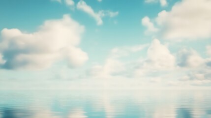 Obraz premium A serene vista of a placid body of water reflecting a pastel sky filled with soft, puffy clouds.