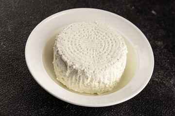 Cottage cheese fermented milk product portion size natural product tasty snack fresh delicious gourmet food background on the table rustic top view copy space keto and paleo diet