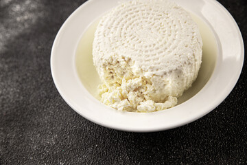Cottage cheese fermented milk product portion size natural product tasty snack fresh delicious gourmet food background on the table rustic top view copy space keto and paleo diet