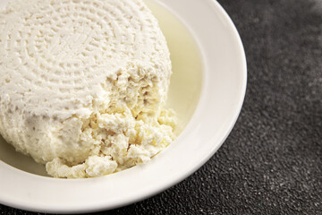 Cottage cheese fermented milk product portion size natural product tasty snack fresh delicious gourmet food background on the table rustic top view copy space keto and paleo diet