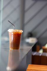 Cold drinks in glasses include cola, iced tea, and various other fresh, sweet beverages perfect for a cafe or bar table