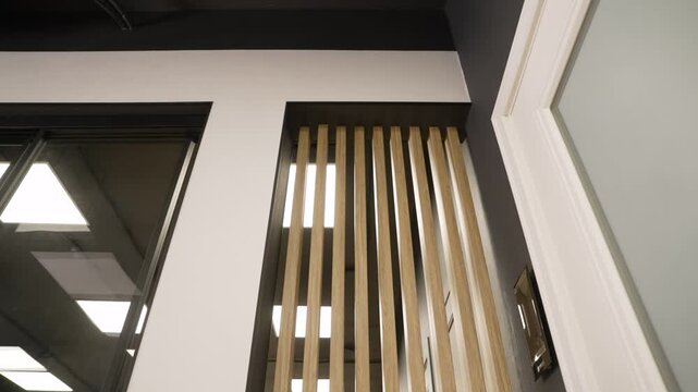 Abstract architectural detail of a contemporary space with warm wood slats providing texture and vertical lines