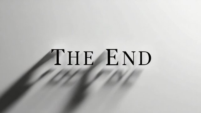 The End Written in Shadow: A simple yet profound message casts a long shadow, conveying a sense of closure and finality, leaving a lasting impression.