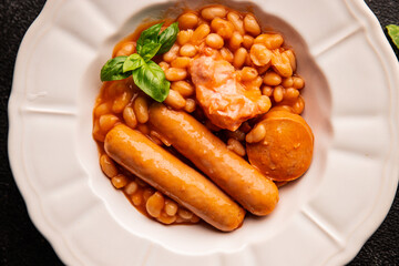 Cassoulet beans with meat and sausage french cuisine vegetables dish natural product tasty snack fresh delicious gourmet food background on the table rustic top view copy space