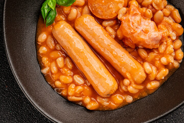 Cassoulet beans with meat and sausage french cuisine vegetables dish natural product tasty snack fresh delicious gourmet food background on the table rustic top view copy space