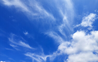 Bright blue sky and cloudy for graphic design or wallpaper.