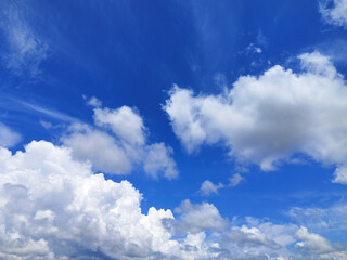 Bright blue sky and cloudy for graphic design or wallpaper.