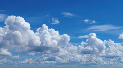 Fototapeta premium Vast Blue Sky With Fluffy Cumulus Clouds