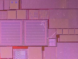 macro photography of semiconductor chip circuit with colorful reflection