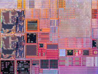 macro photography of semiconductor chip circuit with colorful reflection