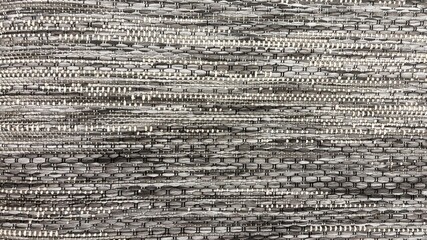 Obraz premium Gray woven fabric texture with abstract pattern, natural textile close up background for design and decoration