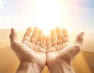 A person's cupped hands holding a bright, glowing light or sun, against a beautiful sunset sky. A spiritual concept for hope, faith, and giving. Generative AI
