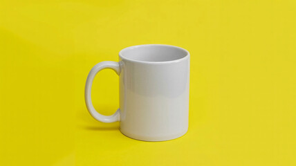 Blank white ceramic mug on vibrant yellow background, ready for custom design and branding