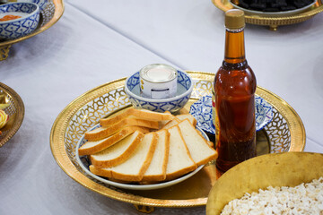 Ritual thai culture and traditional rite sacrificial offering sweet dessert snack variety fruits foods drinks for respect blessing to holy buddha deity angel god mystery worship in Ayutthaya, Thailand
