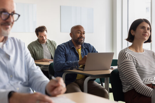 Student listening to an adult education course