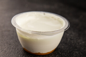 Yogurt or skyr natural dairy lactose free natural product tasty snack fresh delicious gourmet food background on the table rustic top view copy space