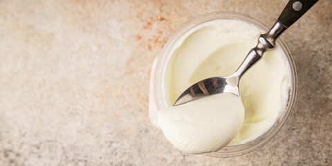 Yogurt or skyr natural dairy lactose free natural product tasty snack fresh delicious gourmet food background on the table rustic top view copy space