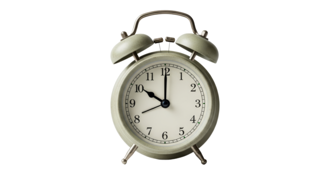 Vintage alarm clock showing nearly ten o'clock indicating time for morning routine or daily activities