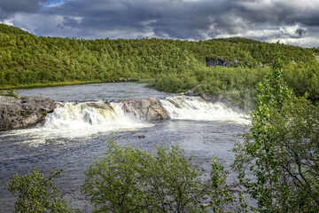 The Pikefossen waterfall in Norway  on the kautokeinoelva river