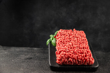 Raw minced meat beef pork ground meat natural product tasty snack fresh delicious gourmet food background on the table rustic top view copy space
