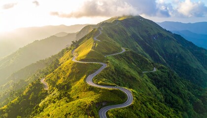 Aerial View of Winding Road on Mountain Peak at Sunset