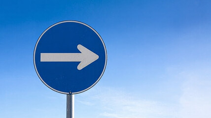 Follow this direction with confidence and clarity using this blue and white directional arrow in transport or navigation projects