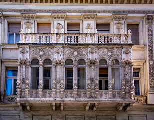 facade with balcony on old building in budapest, hungary