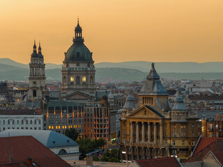 Famous Saint Stephens basilica's towers and dome (hungarian name is Szent istvan bazilika) at sunset time in Budapest city, Hungary, Europe