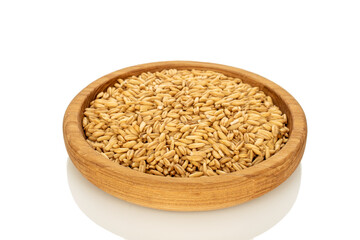 Raw oatmeal isolated on white background, close-up.