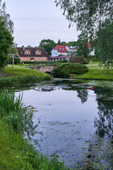 Obraz premium old stone bridge and in the garden