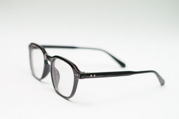 clear glasses minus glasses on a white background isolated. Black plastic eyeglasses frames with...