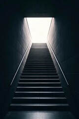 Obraz premium Symmetrical staircase corridor with sleek dark walls and glowing overhead light, creating dramatic contrast and architectural depth