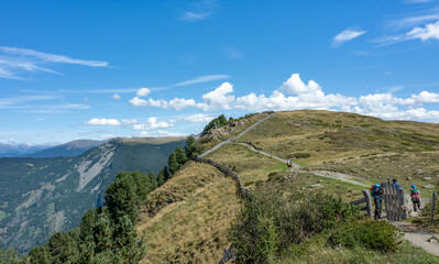 Hiking trail at Alpe di Siusi in Italian Dolomites, South Tyrol.