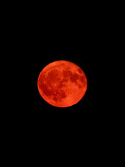 Super blood moon photo, close up, red full moon phase photography.