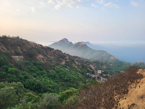 Base village of Mahipatgad trek, Wadi Beldar during early moring sunrise, Khed, Maharashtra