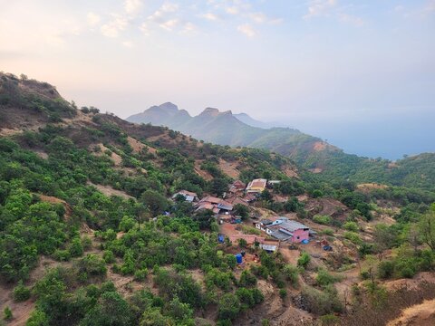 Base village of Mahipatgad trek, Wadi Beldar during early moring sunrise, Khed, Maharashtra