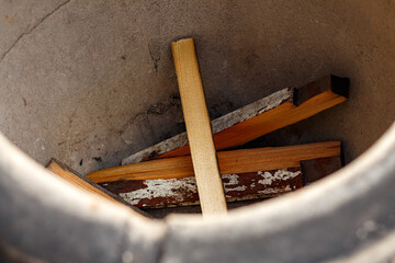 Traditional clay tandoor oven for outdoor cooking, vintage ceramic street stove made of chamotte and decorated with pattern