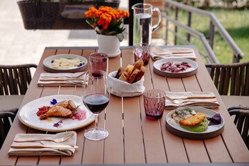 Close-up of Turkish dishes on a wooden café table Casual restaurant dining atmosphere.