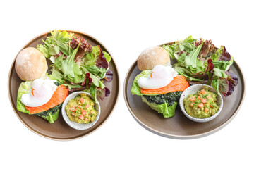 Delectable Plated Brunch: A visually appealing, expertly plated brunch for two. Featuring poached egg, smoked salmon and fresh salad.